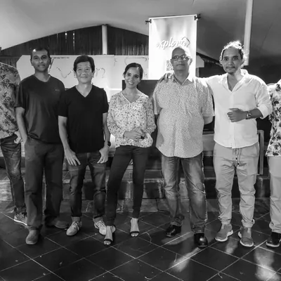 Photographers of Photo exhibition posing at Flic en Flac