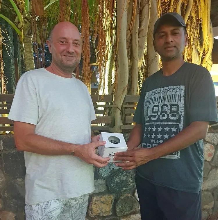 Winner of Photo Contest Natural Wild Forest receiving prize in Pereybere Mauritius from Watch4Sun representative