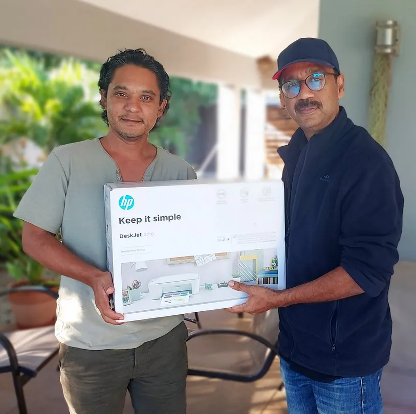 Photo Contest #07 Winner – Roads Photography Winner of Photo Contest Roads Photography receiving prize from Kurt Francois of Explora in Albion Mauritius
