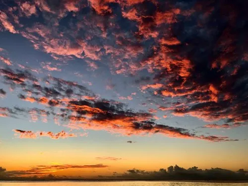 Clouds in fire in heaven on balaclava beach