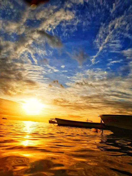 Low angle photography of sunset at Mont Choisy beach