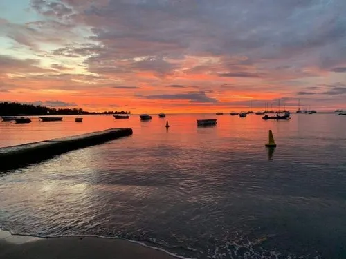 Sunset at Rivière Noire Lagoon near Jetty