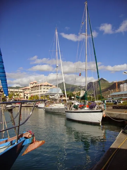 Sailing boats docked in Caudan harbor in Port-Louis
