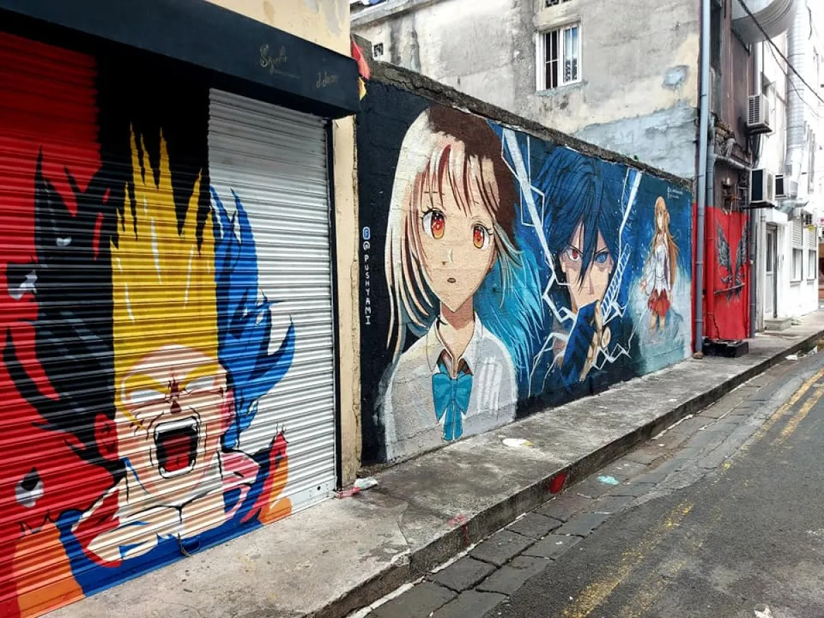 Colorful manga graffiti on walls and shutters in a Port Louis street, Mauritius