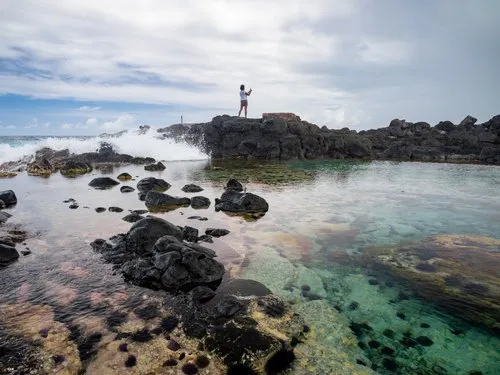 Natural pool and sea urchins at La Cambuse beach