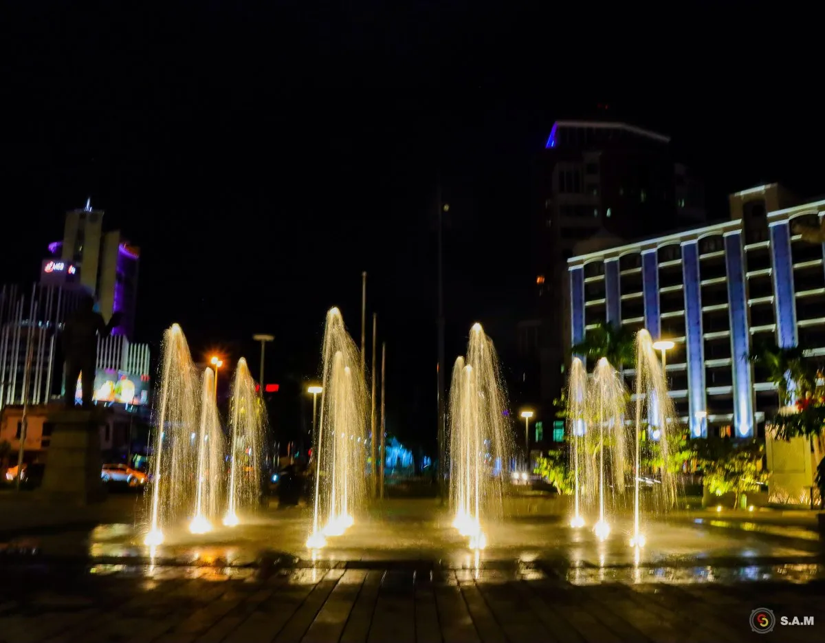 Night view of illuminated water jet at Port Louis waterfront in Mauritius