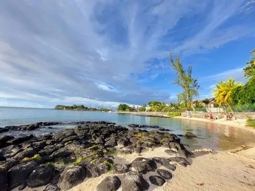 Secluded rocky public beach place around Pereybere