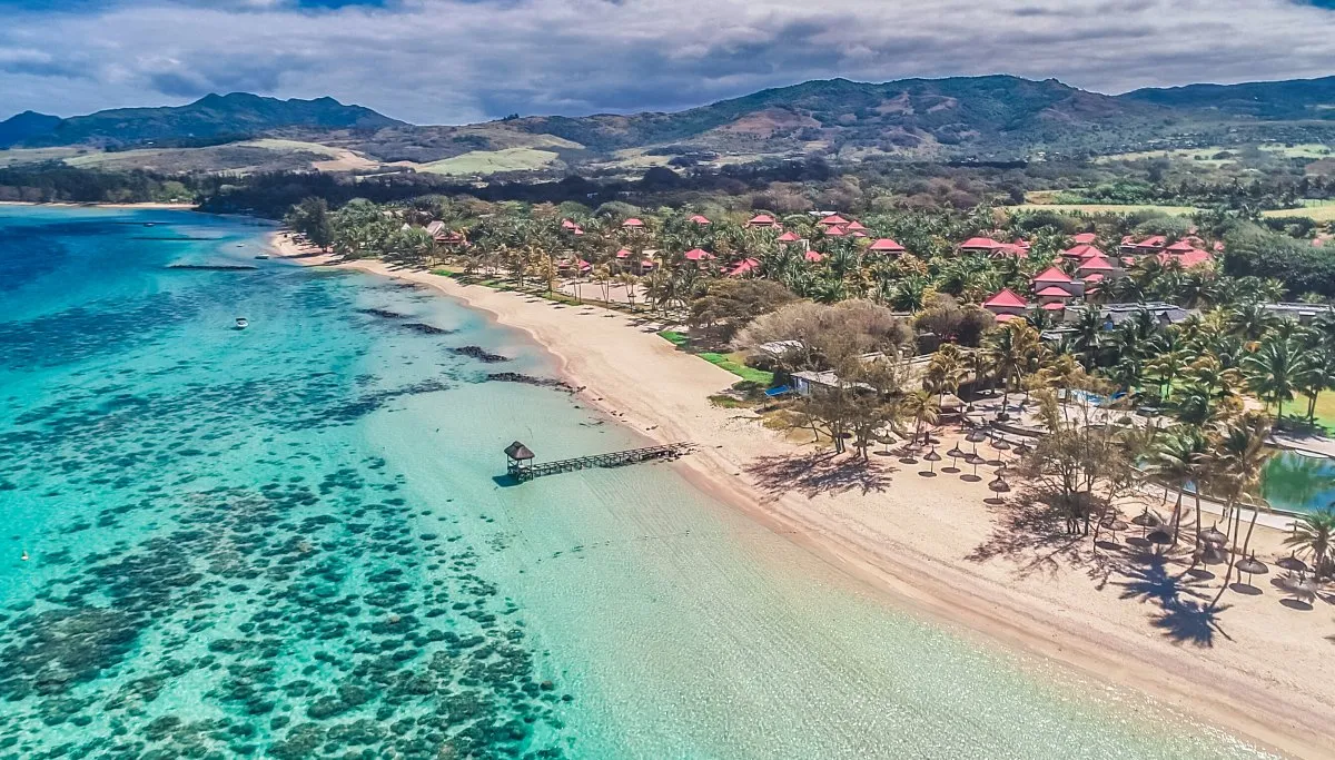 Aerial shot of Bel Ombre beach with white sand and turquoise water in Mauritius