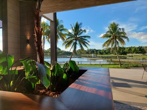 Promenade with lake view of Mahogany Mall in Beau Plan