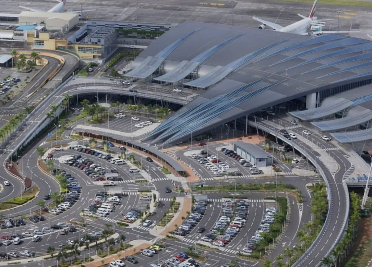 Aerial view of SSR International Airport with runways and surrounding landscape in Mauritius