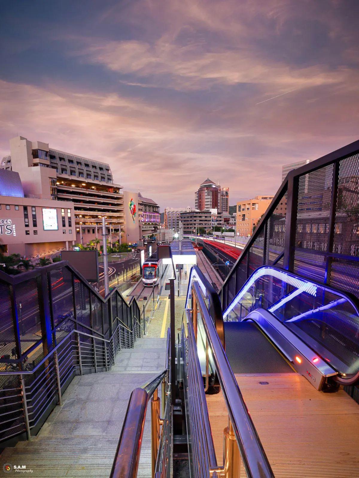 Long exposure photo of motorway and tram terminal with trailing lights at Caudan in Port Louis, Mauritius