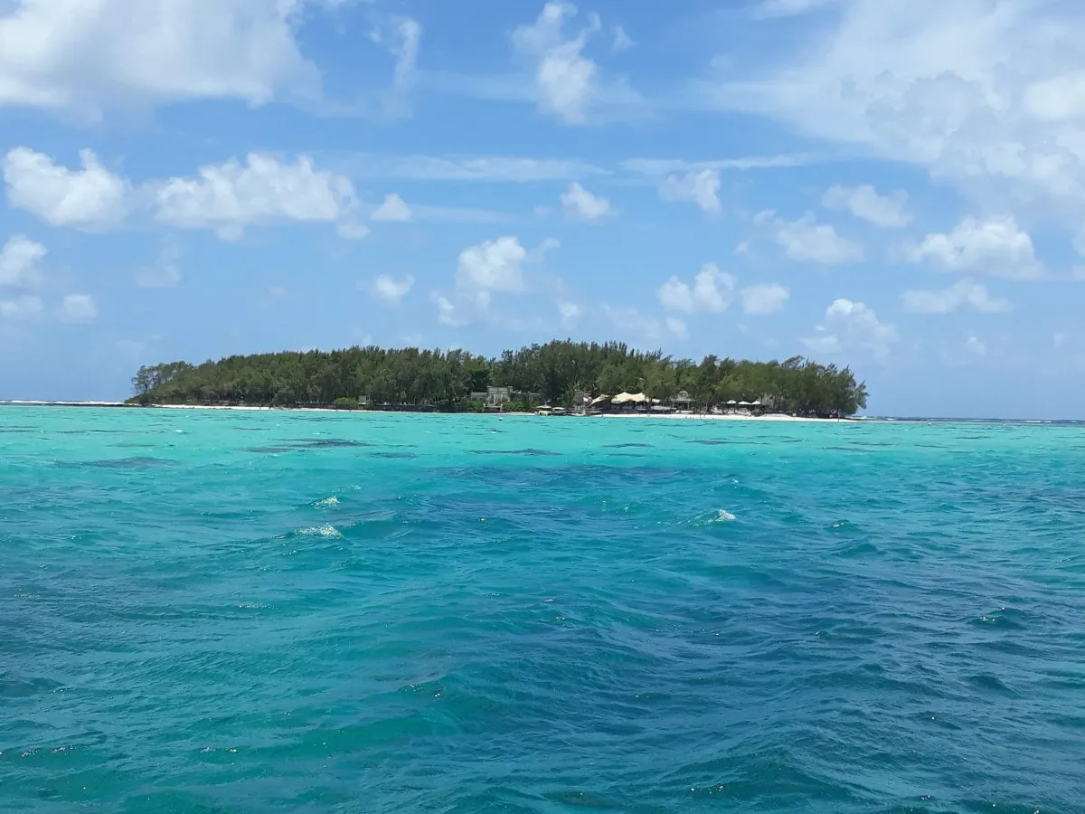 View of Ile des Deux Cocos and turquoise lagoon from the sea in Mauritius