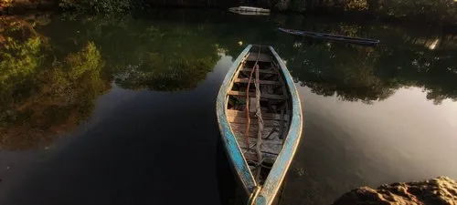Old sank boats at Trou Deau Douce débarcadère