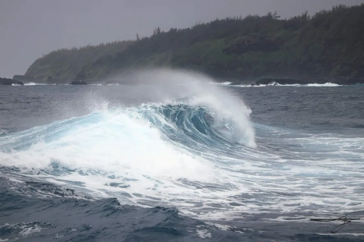 Large waves crashing against cliffs at L'Escalier during Cyclone Batsirai in Mauritius