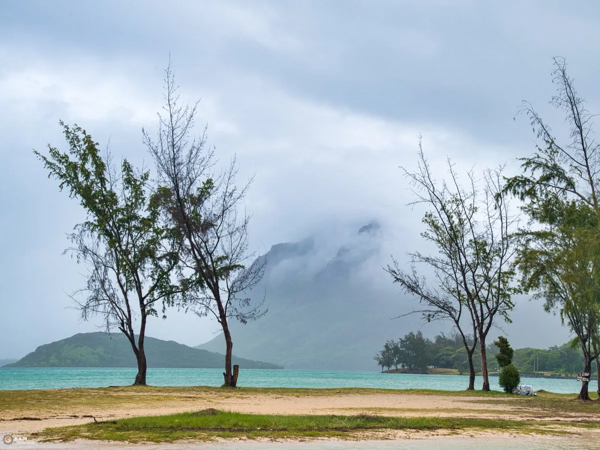 Le Morne Brabant mountain enveloped by grey clouds in Mauritius during overcast weather