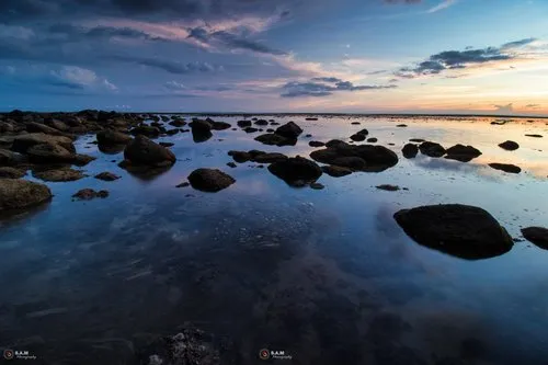 Calm & shallow water of the lagoon at Souillac