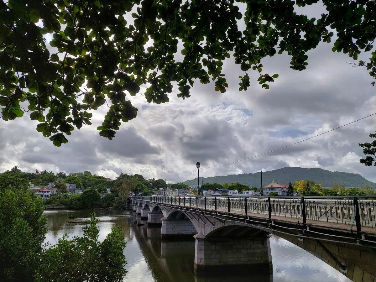 Cavendish Bridge over Riviere La Chaux in Mahebourg, Mauritius with cloudy sky