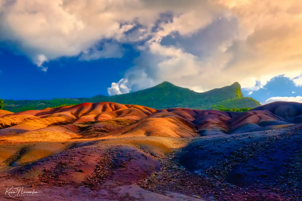 Seven colored earths at Chamarel with mountainous landscape in Mauritius