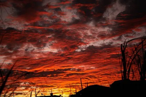 Threatening reddish clouds in Mauritian sky after sunset