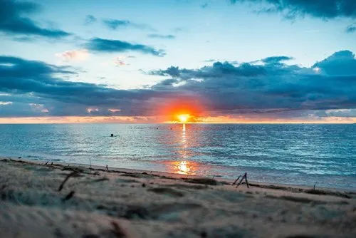 Reddish Sunset in peaceful beach lagoon