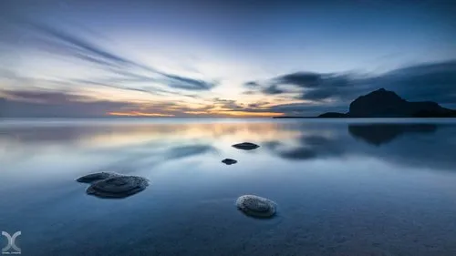 Long exposure of calm sea of La Prairie during blue hour