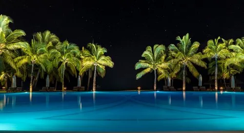 Large peaceful lonely illuminated hotel pool