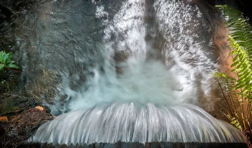 Close-up of water falling in a stream at Casela