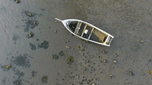Aerial view of wrecked wooden boat at Case Noyale