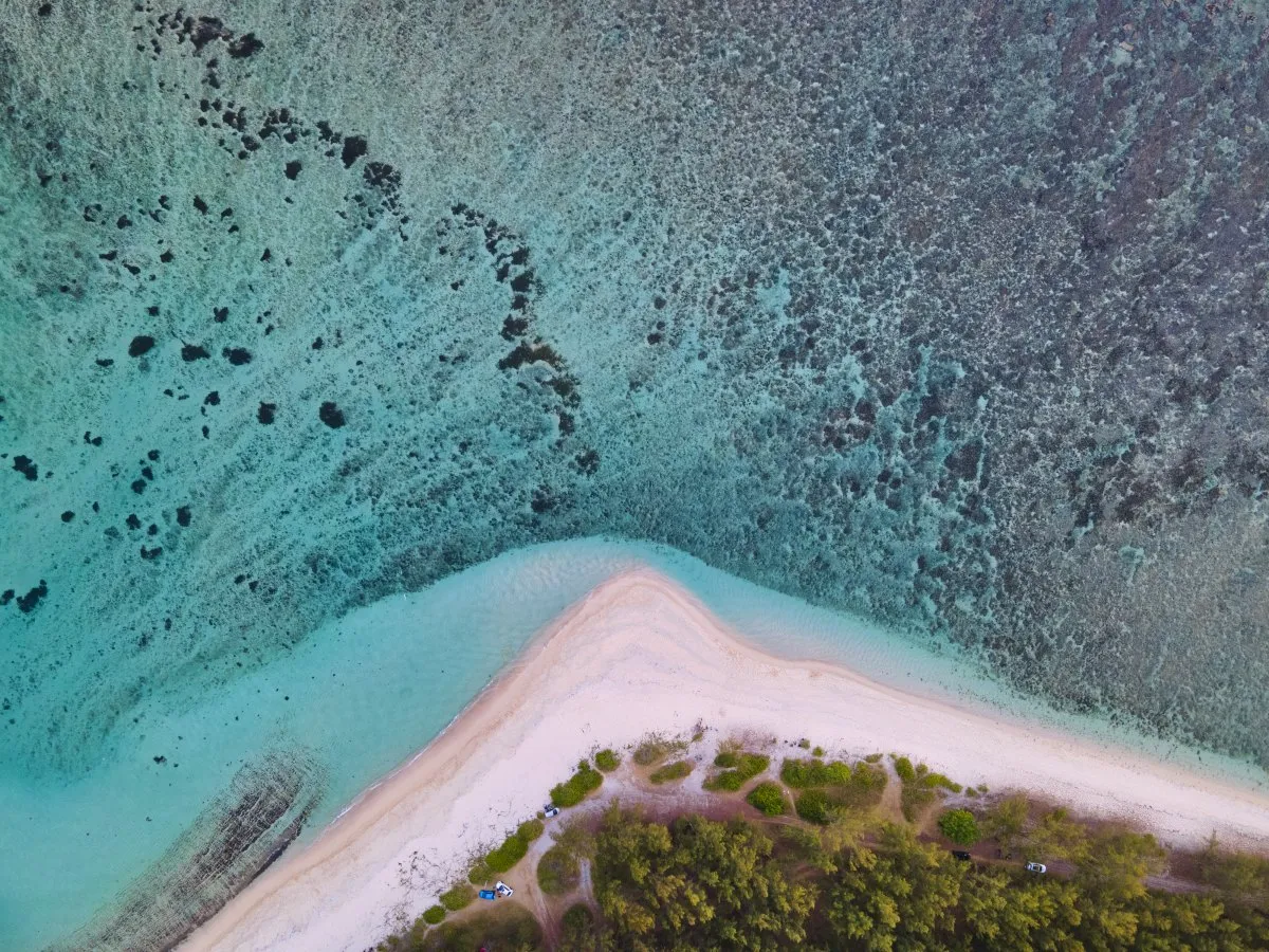 Aerial view of Pomponette Beach with calm waters and shoreline in Mauritius