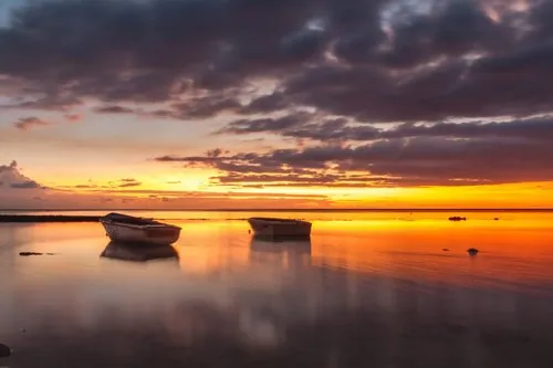 Picturesque orange sky over Balaclava beach after sunset