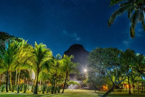 Luxury Resort garden with Le Morne brabant during starry night