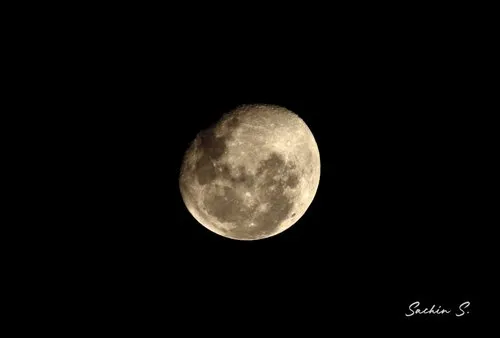 A lonely near full moon during starless sky in Mauritius