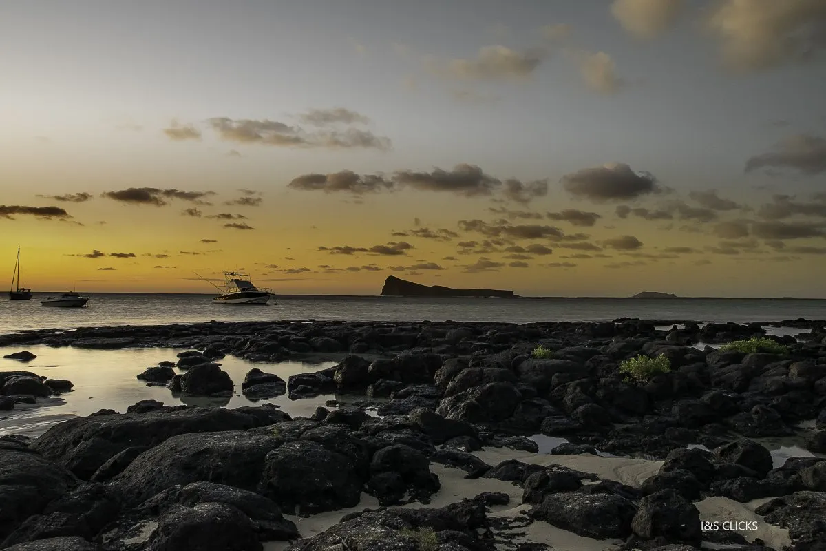 Silhouette of Coin de Mire Island after sunset seen from a northern beach in Mauritius