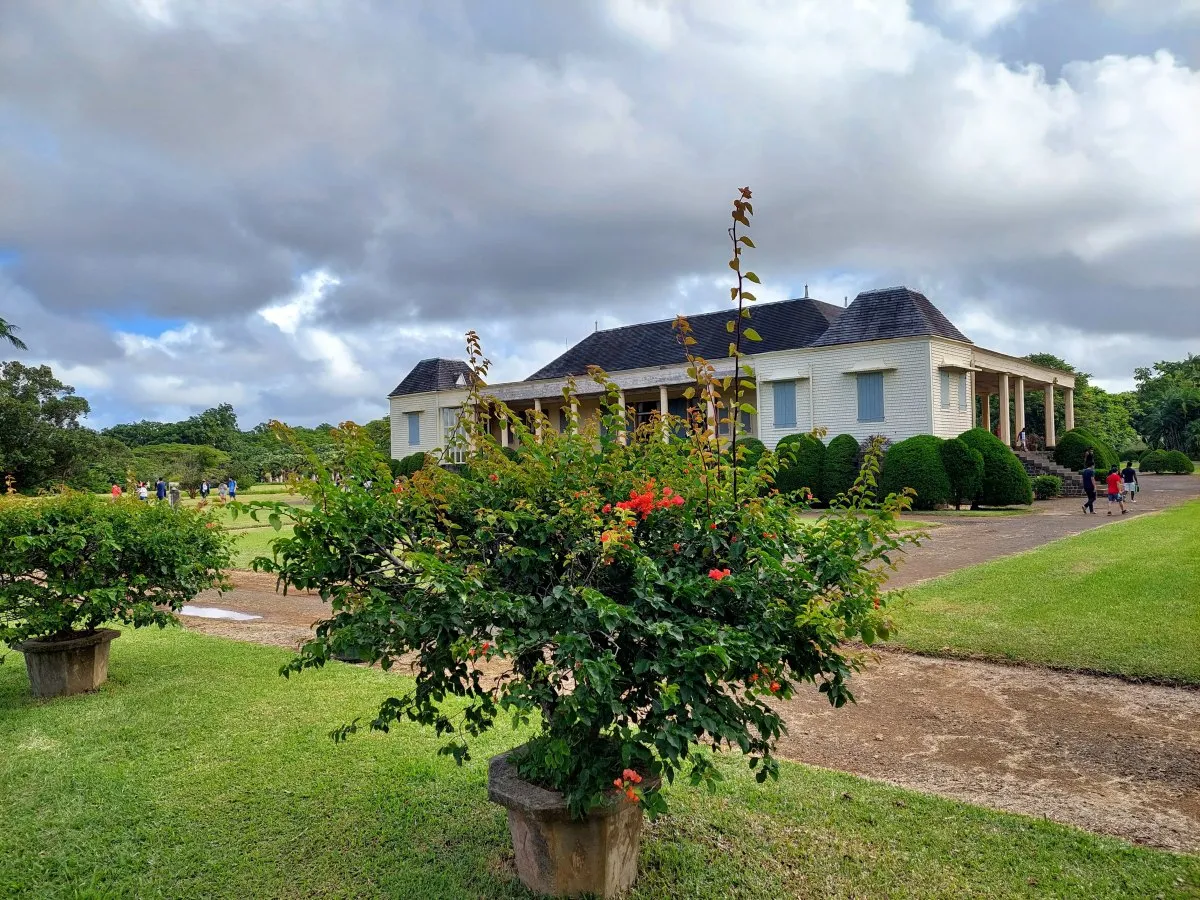 Colonial wooden Chateau de Riche en Eau castle and courtyard in southern Mauritius