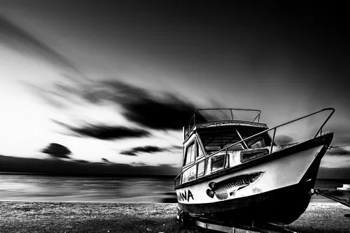 Old angler's boat on the beach of Albion