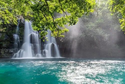 The blue water of Eau Bleue waterfall