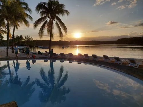 Sunset by the pool at Le Shandrani Hotel