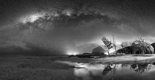 Milky way with beach landscape in black and white