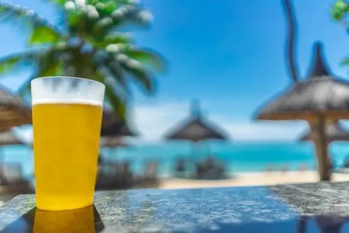 Hotel beer glass at outdoor beach bar et resort