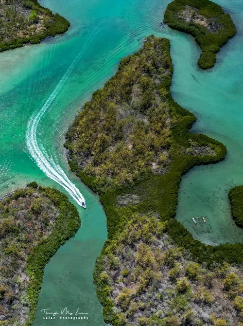 Ile aux cerf turquoise lagoon aerial view