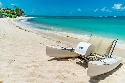 Pedalo lying on paradise beach at Constance hotel
