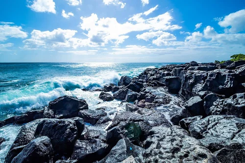 Waves Crashing on the Rocky Shore of Club Med Albion