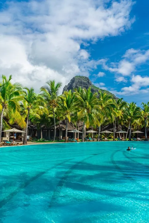 Photo of turquoise pool in portrait mode with Le Morne mountain