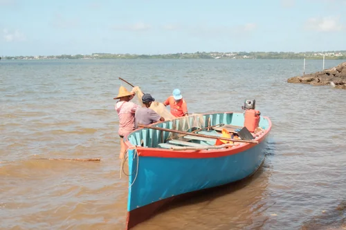 Fishermen in a Boat at Falaise Rouge, Grand Port Bay