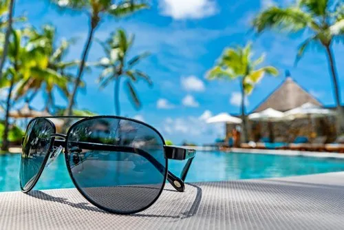 Sunglasses by 5-star beautiful Hotel pool