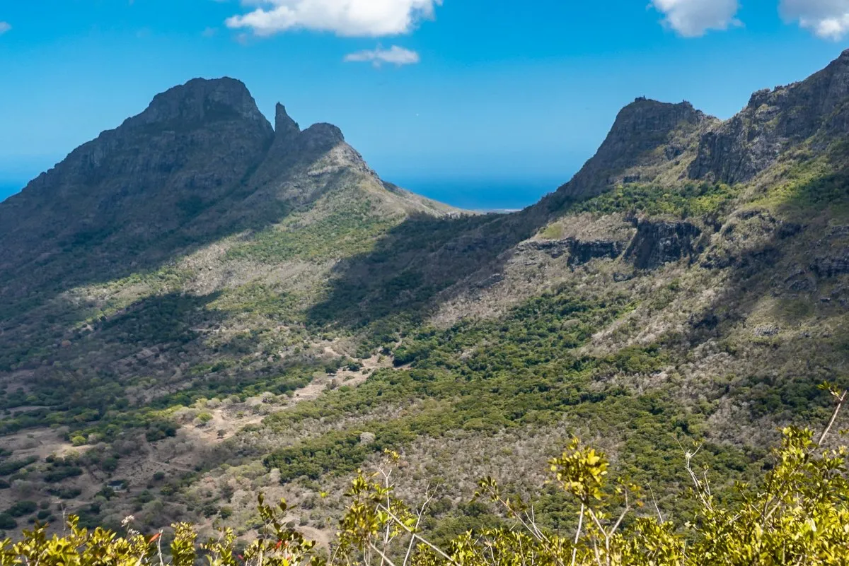 Ocean between two mountain peaks in the nature reserve of Mauritius
