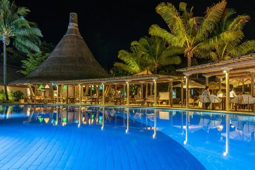 Illuminated Pool reflection at night