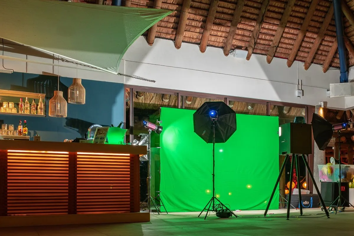 Photo booth setup with green screen and LED lights at Heritage C Beach Club in Mauritius