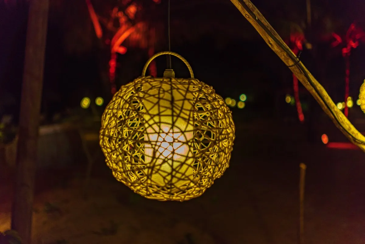 3D hanging ball lights decoration glowing at Heritage C Beach Club in Mauritius at night