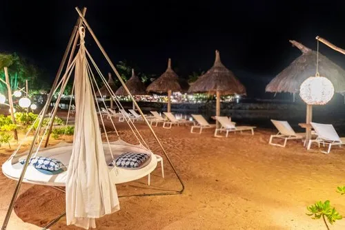 Floating outdoor teepee tent bed on the beach